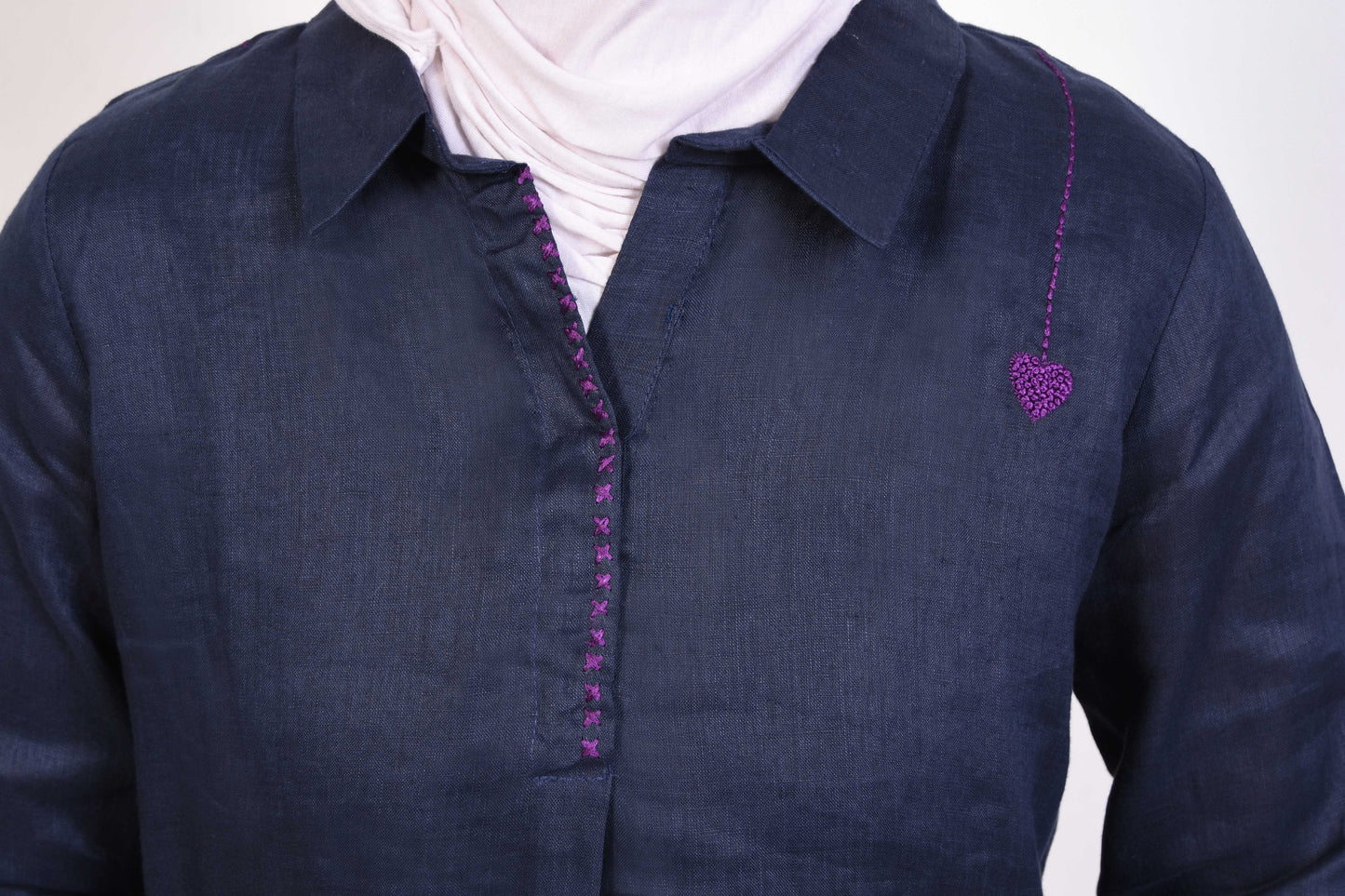 Navy blue shirt with subtle purple stitching, displayed on white background