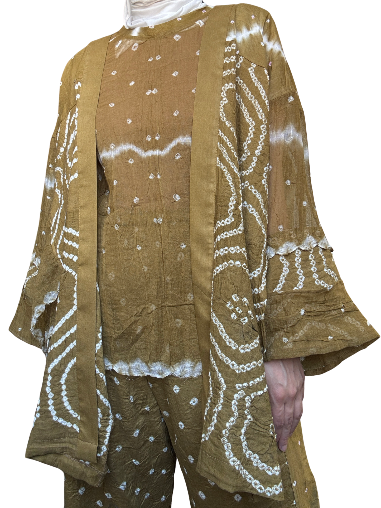 Brown outfit with white patterns on a plain background