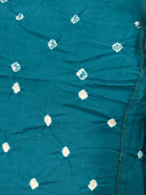 Teal fabric with white floral patterns