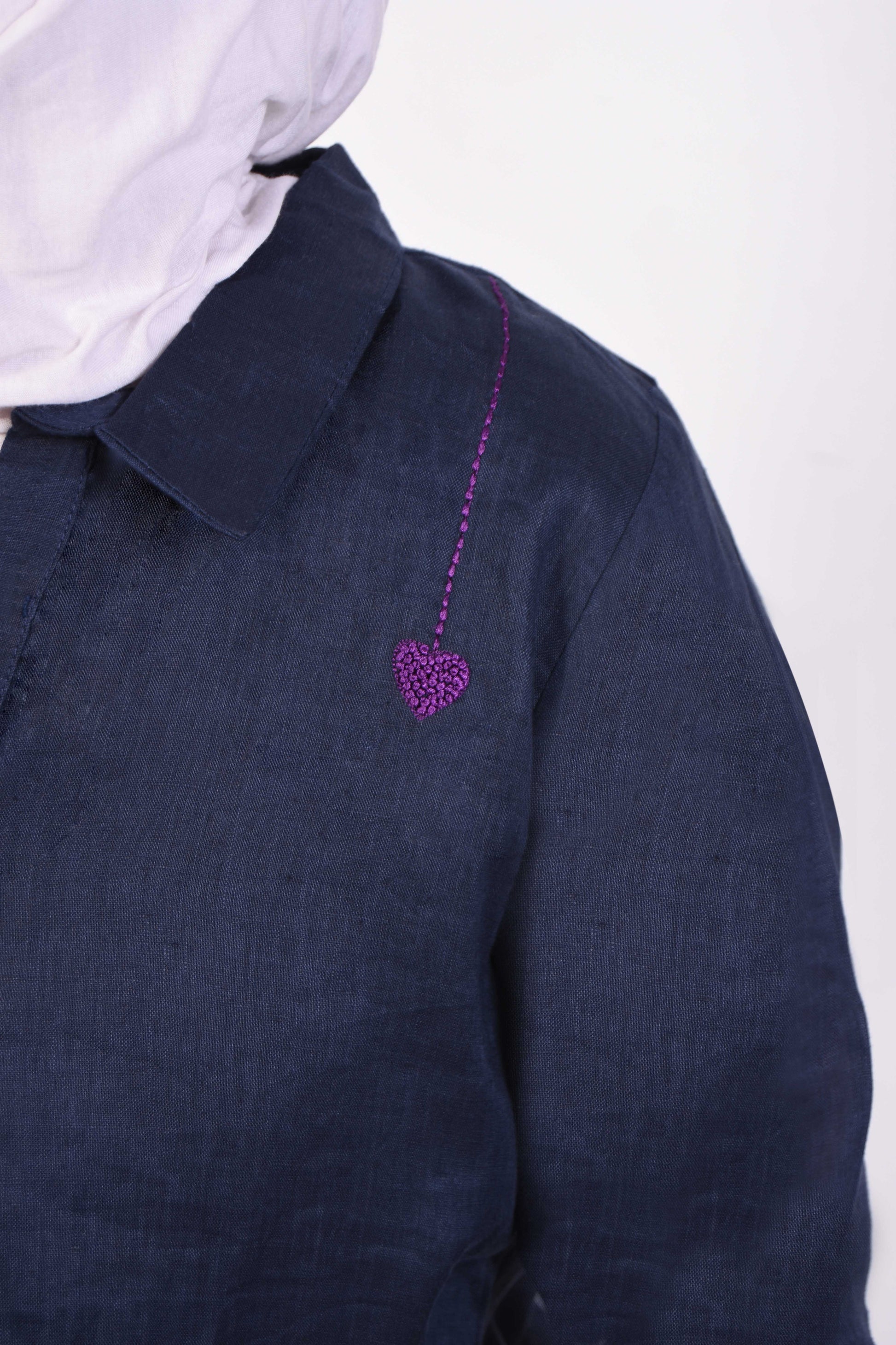 Lightweight navy blue summer top with purple heart embroidery, made from premium Indian linen.