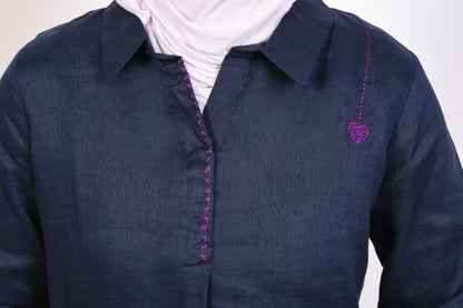Navy blue shirt with subtle purple stitching, displayed on white background