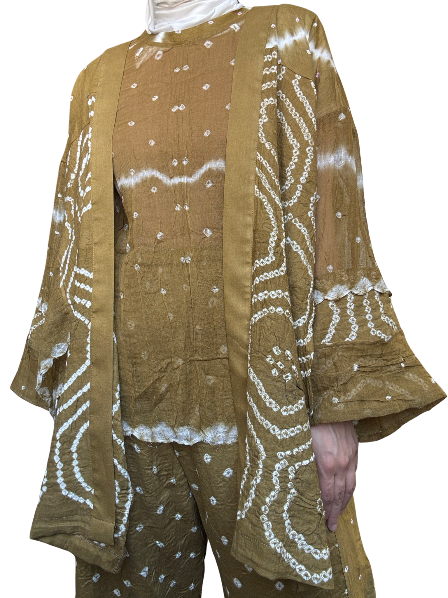 Brown outfit with white patterns on a plain background